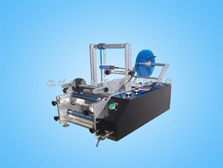 Semi-automatic round bottle labeling Machine